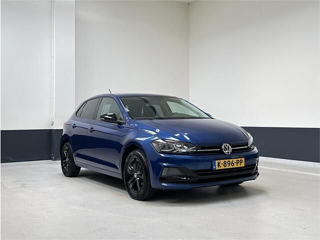 Blauw, metallic lak Gebruikt 2020 VW Polo Comfortline Hatchback | € 14.949 (Goede deal) - Afbeelding 1/4