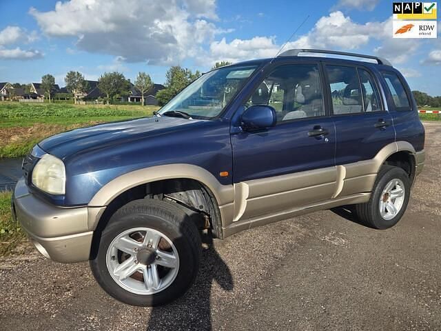 Blauw Gebruikt 2002 Suzuki Grand Vitara SUV | € 3.450 (Iets duurder) - Afbeelding 1/4