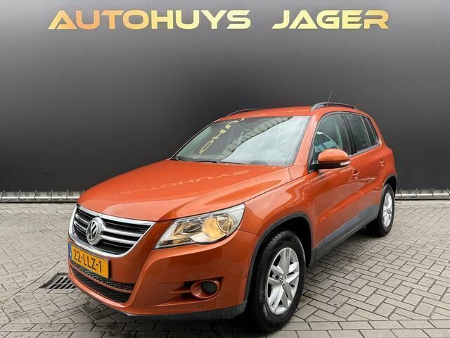 Oranje, metallic lak Gebruikt 2010 VW Tiguan Comfortline SUV | € 6.950 (Eerlijke prijs) - Afbeelding 1/4