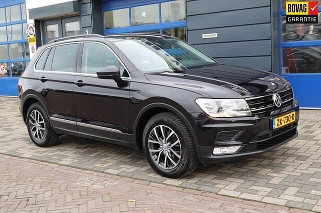Zwart (metallic) Occasion 2016 VW Tiguan SUV | € 17.250 (Goede deal) - Afbeelding 1/4