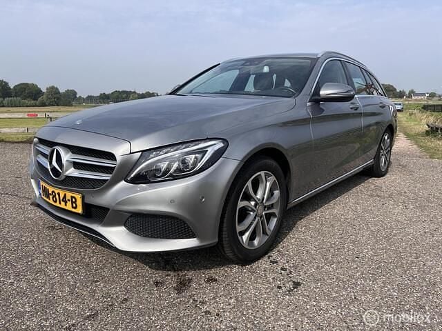 Grijs Gebruikt 2015 Mercedes C250 Prestige Stationwagen | € 12.950 (Goede deal) - Afbeelding 1/4