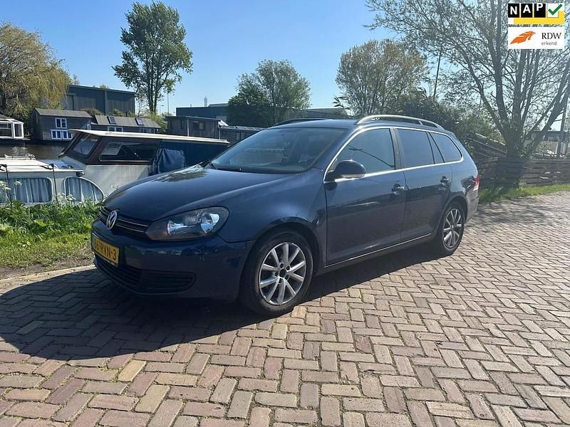Blauw (metallic) Gebruikt 2011 VW Golf VI Comfortline Stationwagen | € 2.250 (Super prijs) - Afbeelding 1/4