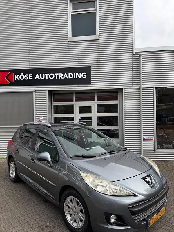 Grijs Gebruikt 2011 Peugeot 207 Active Stationwagen | € 1.990 (Eerlijke prijs) - Afbeelding 1/4