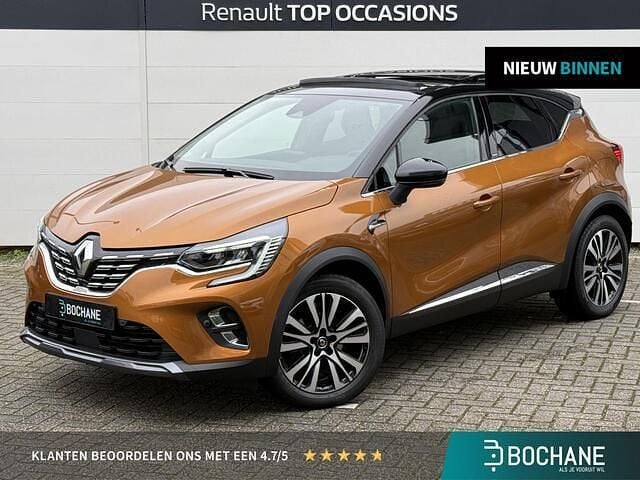 Oranje Occasion 2021 Renault Captur Initiale Paris SUV | € 22.900 (Iets duurder) - Afbeelding 1/4