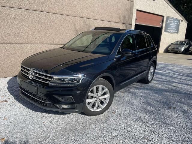 Zwart Gebruikt 2017 VW Tiguan Highline SUV | € 19.990 (Goede deal) - Afbeelding 1/4