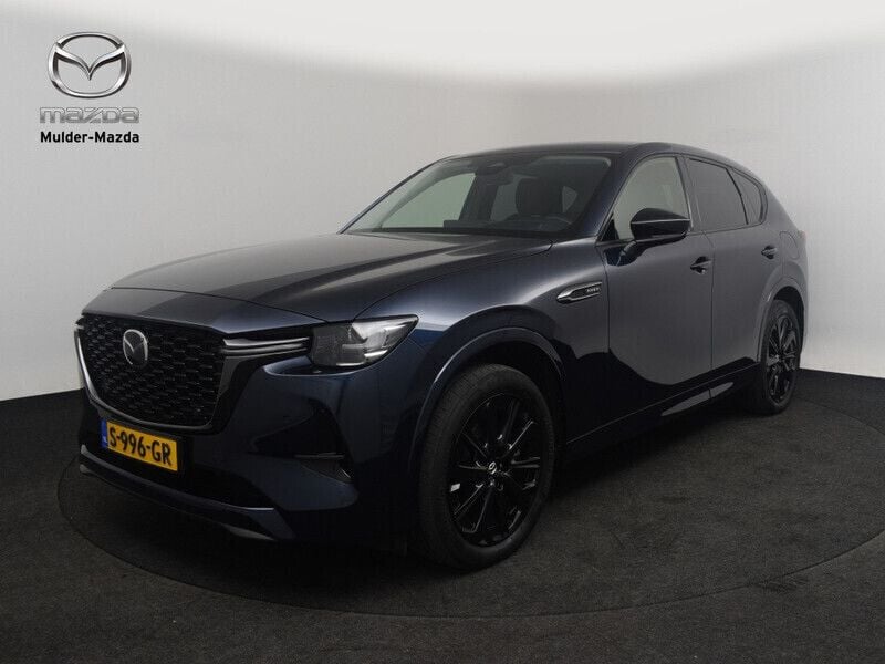 Deep crystal blue (blauw metallic) Gebruikt 2023 Mazda CX-60 Homura-Line SUV | € 39.750 (Goede deal) - Afbeelding 1/4
