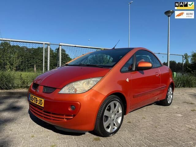 Oranje Gebruikt 2006 Mitsubishi Colt Invite Cabriolet | € 1.999 (Eerlijke prijs) - Afbeelding 1/4