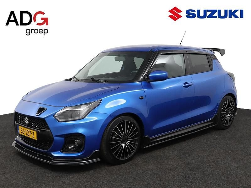 Blauw Gebruikt 2018 Suzuki Swift Hatchback | € 14.950 (Eerlijke prijs) - Afbeelding 1/4