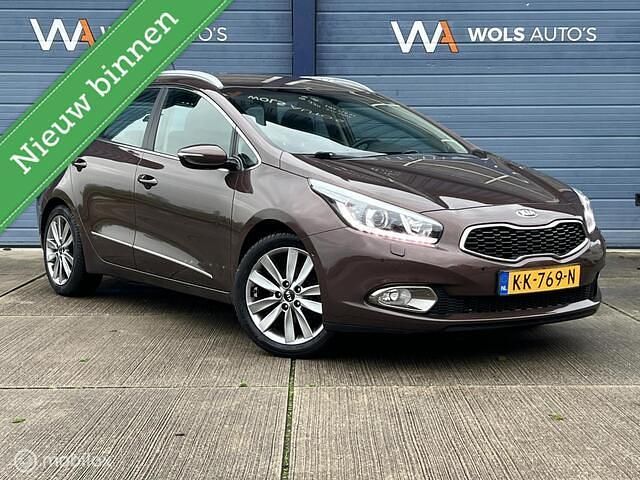 Bruin Occasion 2012 Kia Ceed Sportswagon Stationwagen | € 8.940 (Eerlijke prijs) - Afbeelding 1/4