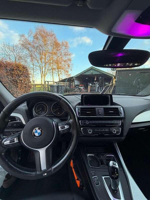 Bruin Occasion 2015 BMW 116 Sport Line Hatchback | € 9.500 (Eerlijke prijs) - Afbeelding 1/4