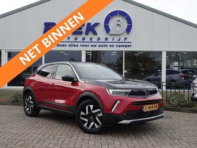 Rood (metallic) Gebruikt 2021 Opel Mokka-e Business Elegance SUV | € 15.895 (Eerlijke prijs) - Afbeelding 1/4