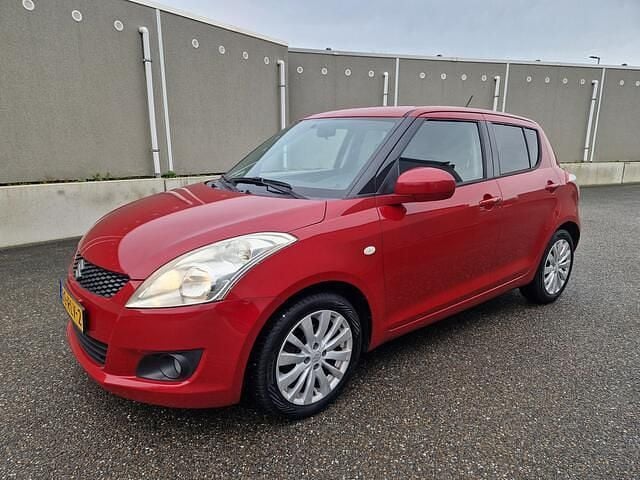 Rood Gebruikt 2011 Suzuki Swift Exclusive Hatchback | € 3.950 (Iets duurder) - Afbeelding 1/4