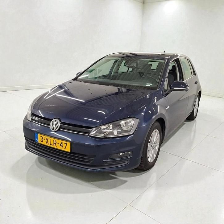 Blauw (metallic) Gebruikt 2014 VW Golf VII Comfortline Hatchback | € 8.999 (Super prijs) - Afbeelding 1/4