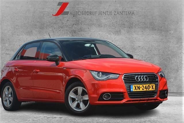 Rood, metallic lak Gebruikt 2012 Audi A1 Sportback Proline Hatchback | € 7.950 (Super prijs) - Afbeelding 1/4