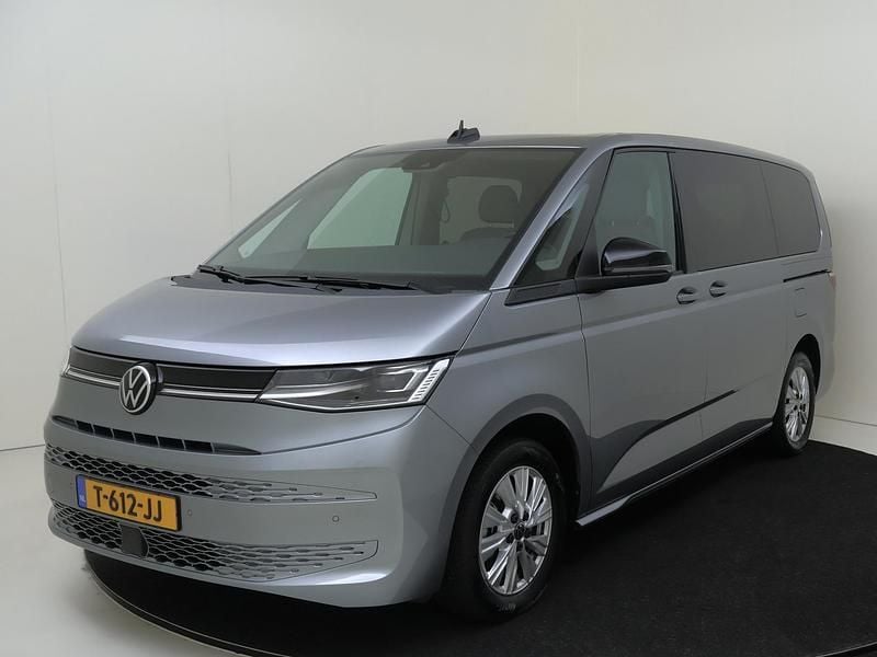 Grijs Gebruikt 2023 VW Multivan Style Van | € 56.950 (Eerlijke prijs) - Afbeelding 1/4