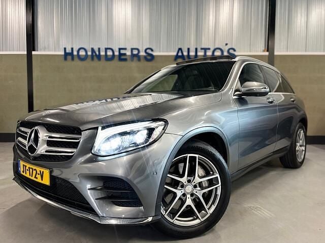 Grijs, metallic lak Gebruikt 2016 Mercedes GLC250 Ambition SUV | € 25.945 (Eerlijke prijs) - Afbeelding 1/4