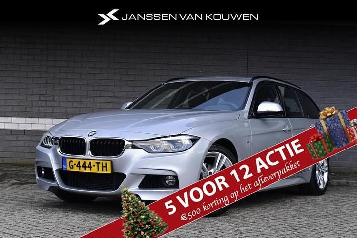 Grijs (metallic) Gebruikt 2019 BMW 318 M Sport Stationwagen | € 22.950 (Eerlijke prijs) - Afbeelding 1/4