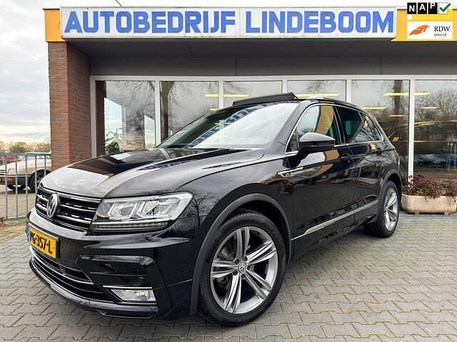 Zwart (metallic) Gebruikt 2017 VW Tiguan R-line SUV | € 24.950 (Iets duurder) - Afbeelding 1/4
