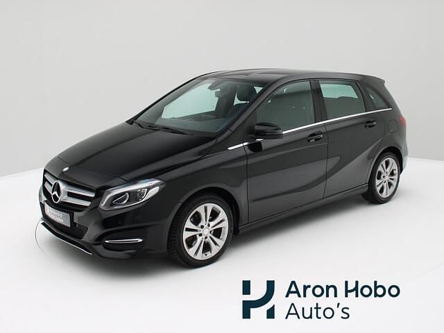 Zwart Gebruikt 2015 Mercedes B180 Ambition MPV | € 15.950 (Eerlijke prijs) - Afbeelding 1/4