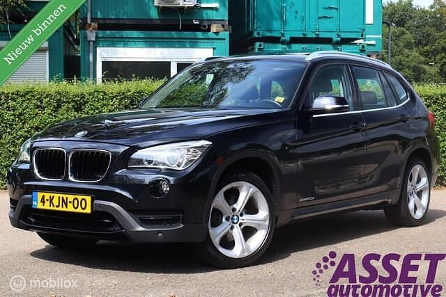 Zwart Gebruikt 2013 BMW X1 Executive SUV | € 14.995 (Iets duurder) - Afbeelding 1/4