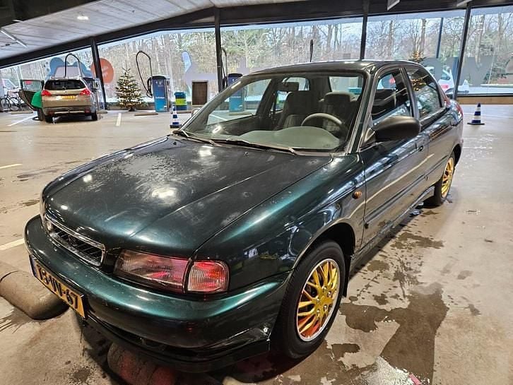 Gebruikt 1998 Suzuki Baleno Sedan | € 999 - Afbeelding 1/4