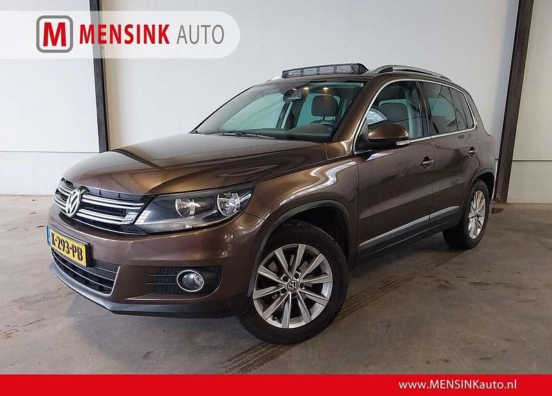 Bruin (metallic) Occasion 2012 VW Tiguan Sport SUV | € 9.950 (Goede deal) - Afbeelding 1/4