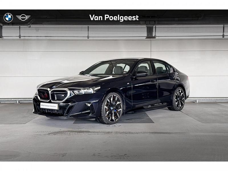 M carbonschwarz Gebruikt 2023 BMW i5 Comfort Edition Sedan | € 67.500 (Eerlijke prijs) - Afbeelding 1/4