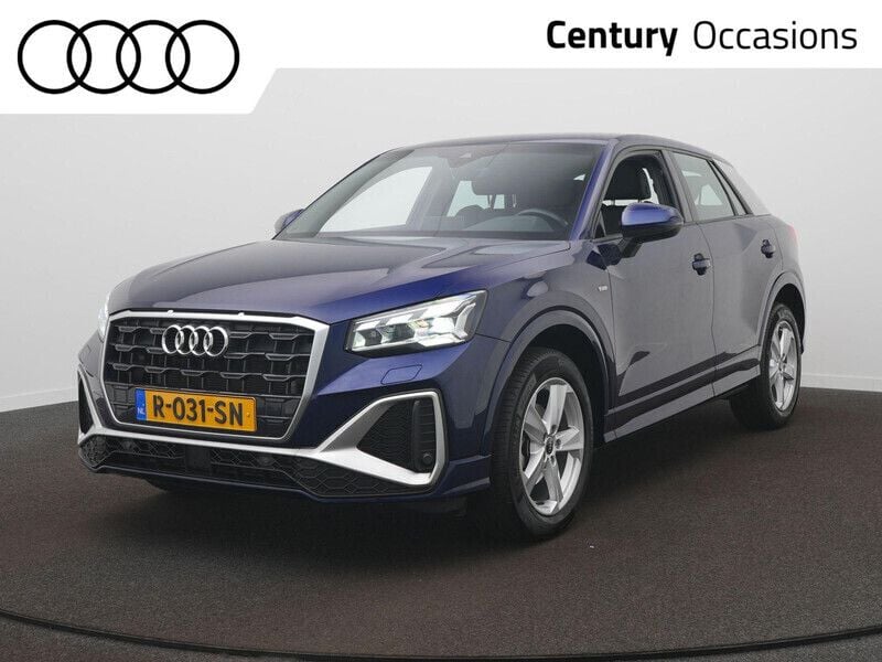 Blauw, metallic lak Gebruikt 2022 Audi Q2 S-Line SUV | € 32.900 (Eerlijke prijs) - Afbeelding 1/4