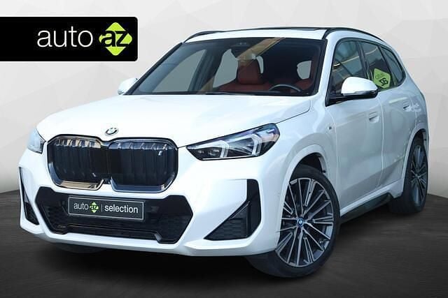 Wit (metallic) Gebruikt 2023 BMW iX1 M Sport SUV | € 39.900 (Goede deal) - Afbeelding 1/4