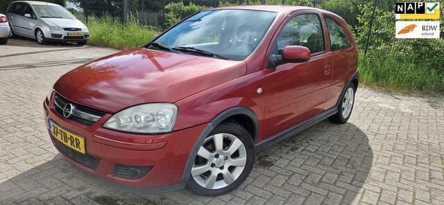 Rood Gebruikt 2006 Opel Corsa Hatchback | € 1.250 (Goede deal) - Afbeelding 1/4