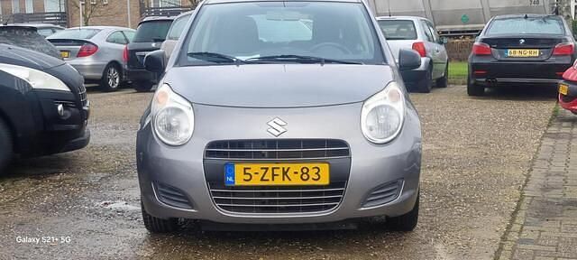 Occasion Suzuki Alto 68 PK (50 kW) 2015 Grijs, metallic lak Hatchback
