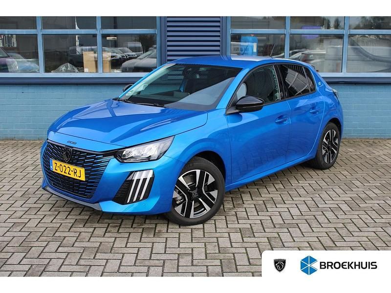 Blauw Gebruikt 2024 Peugeot e-208 Style Hatchback | € 21.700 (Eerlijke prijs) - Afbeelding 1/4