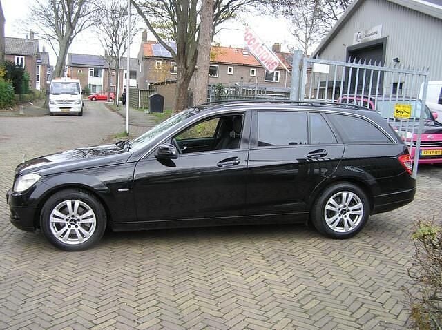 Occasion Mercedes C180 157 PK (115 kW) 2009 Zwart (metallic) Stationwagen