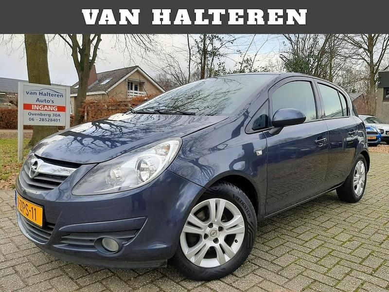 Blauw (metallic) Gebruikt 2010 Opel Corsa Edition Hatchback | € 3.999 (Goede deal) - Afbeelding 1/4