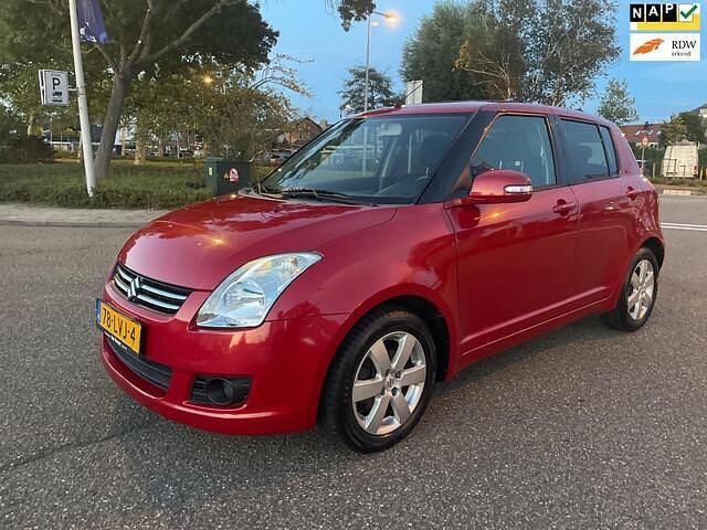 Rood Gebruikt 2010 Suzuki Swift Limited Hatchback | € 6.995 (Iets duurder) - Afbeelding 1/4