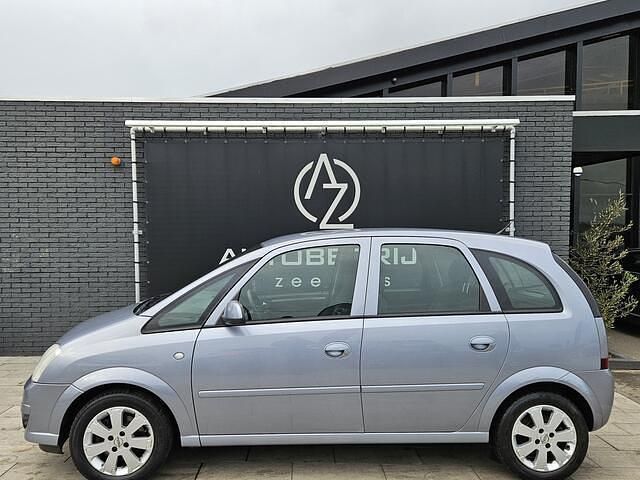 Grijs Gebruikt 2009 Opel Meriva Cosmo MPV | € 2.499 (Eerlijke prijs) - Afbeelding 1/4