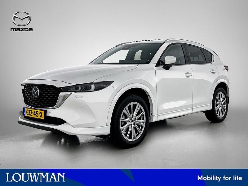 Rodium white (licht wit metallic) Gebruikt 2024 Mazda CX-5 Takumi-Line SUV | € 45.945 (Duur) - Afbeelding 1/4