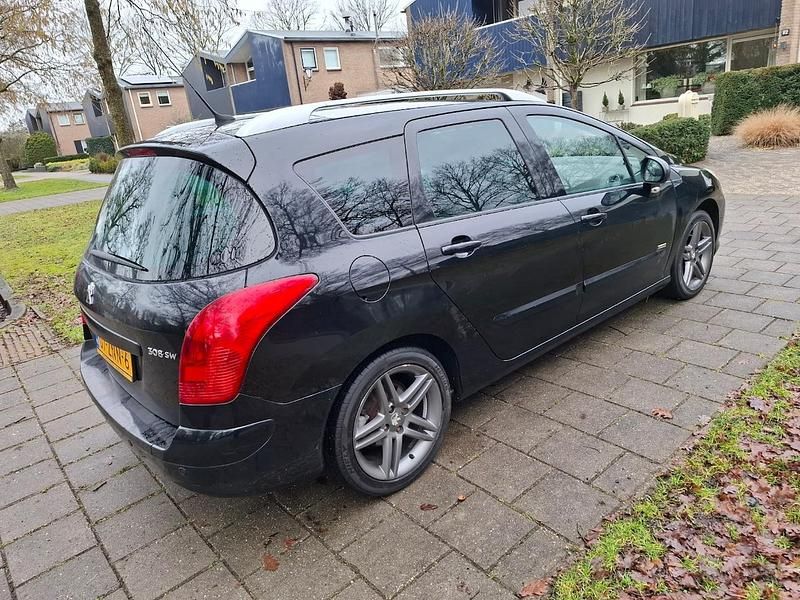 Occasion Peugeot 308 SW Sportium 2013 Zwart Stationwagen