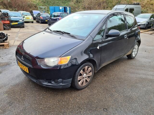 Zwart Gebruikt 2009 Mitsubishi Colt Invite Hatchback | € 1.950 (Eerlijke prijs) - Afbeelding 1/4
