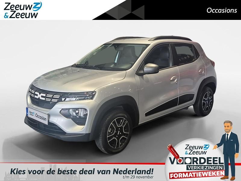 Grijs Gebruikt 2024 Dacia Spring Expression Hatchback | € 17.950 - Afbeelding 1/4