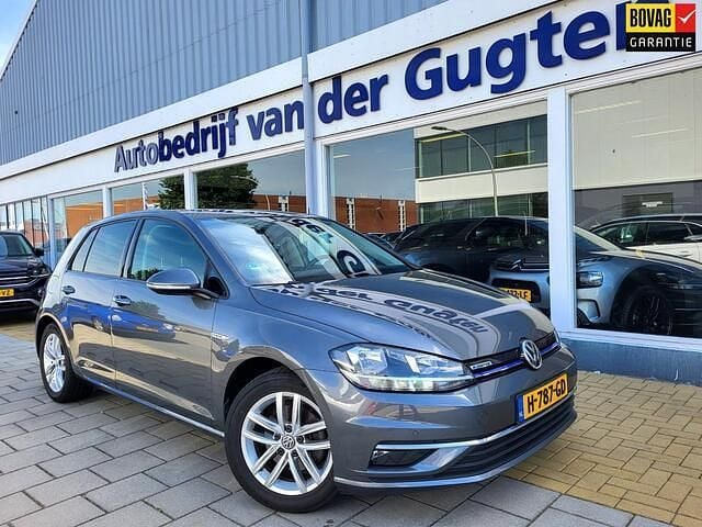 Grijs, metallic lak Gebruikt 2019 VW Golf VII Comfortline Hatchback | € 12.950 (Eerlijke prijs) - Afbeelding 1/4