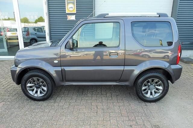 Occasion Suzuki Jimny Exclusive 86 PK (63 kW) 2015 Grijs, metallic lak SUV