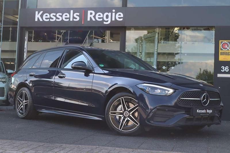 Blauw Gebruikt 2022 Mercedes C300e AMG Stationwagen | € 37.950 (Eerlijke prijs) - Afbeelding 1/4