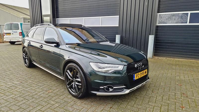 Groen (metallic) Occasion 2014 Audi A6 Allroad Premium Stationwagen | € 16.999 - Afbeelding 1/4