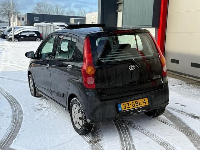 Occasion Daihatsu Cuore 69 PK (50 kW) 2008 Zwart Hatchback