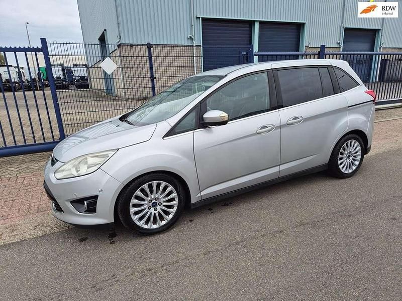 Grijs Gebruikt 2012 Ford Grand C-Max Titanium MPV | € 5.450 (Eerlijke prijs) - Afbeelding 1/4