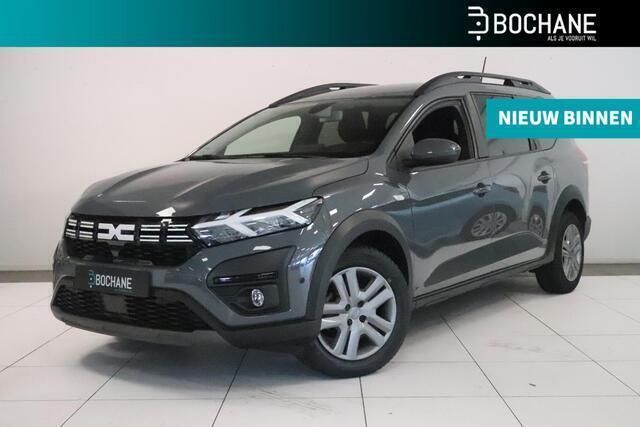 Grijs, metallic lak Gebruikt 2023 Dacia Jogger Expression MPV | € 18.900 (Eerlijke prijs) - Afbeelding 1/4