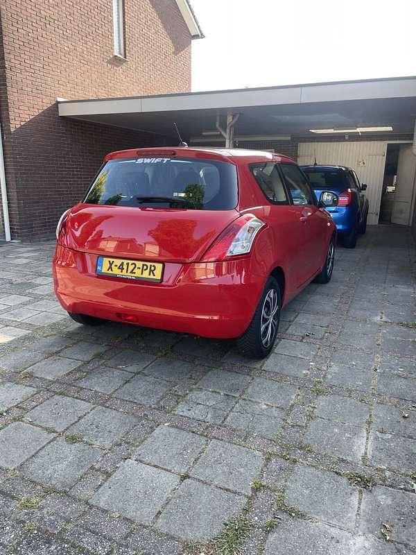 Occasion Suzuki Swift 94 PK (69 kW) 2013 Rood Hatchback