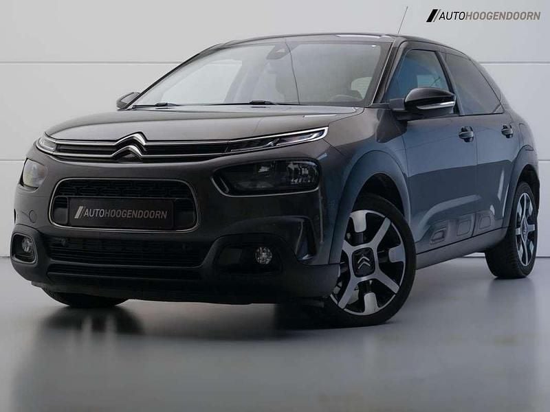 Grijs, metallic lak Gebruikt 2018 Citroën C4 Cactus PureTech Hatchback | € 12.945 (Eerlijke prijs) - Afbeelding 1/4