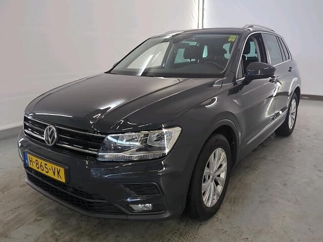 Grijs, metallic lak Gebruikt 2020 VW Tiguan Highline SUV | € 25.450 (Goede deal) - Afbeelding 1/4